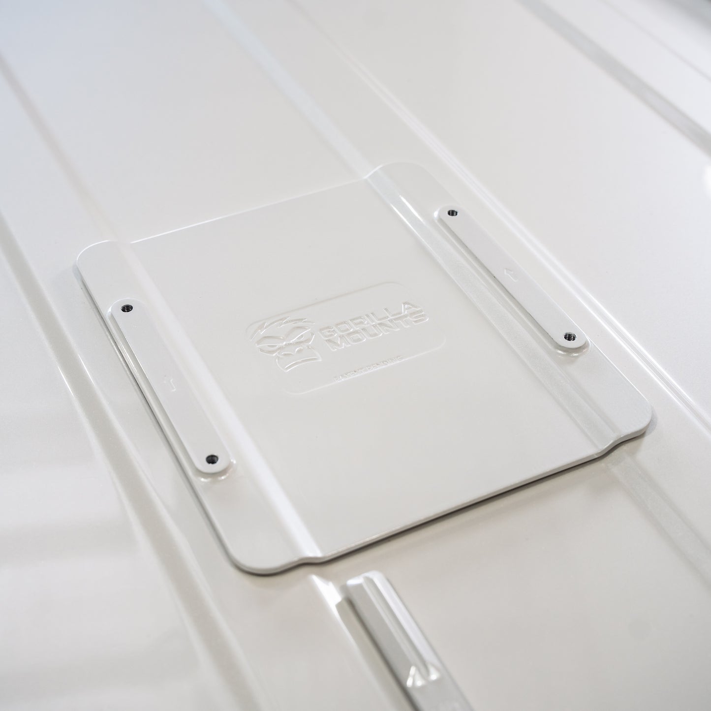 White Gorilla Mounts LC300 VHB roof plate installed between the LandCruiser roof ribs