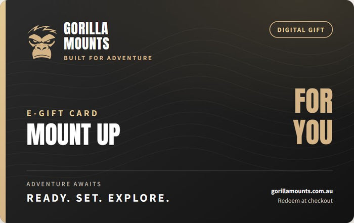 Gorilla Mounts E-Gift Card: Mount Up, For You. Charcoal and gold with topographic linework.